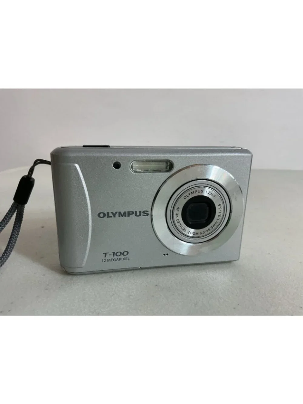 Olympus T-100 12 Megapixel Digital Camera Silver No Charger Works